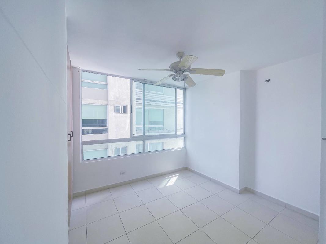 Bright bedroom with built-in closet, large window and ocean view PH Terrasol Panama