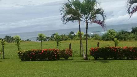 Lush landscaped gardens beachfront property Pedasi Panama with tropical foliage