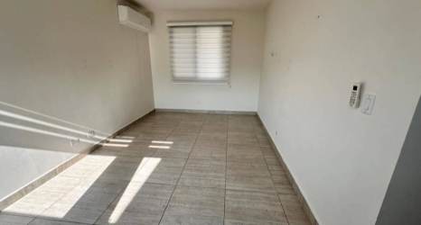 Spacious walk-in closet with shelves and hanging rods Panama Pacifico house