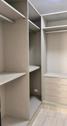 Luxury bathroom with double sinks and glass shower Nativa house Panama Pacifico