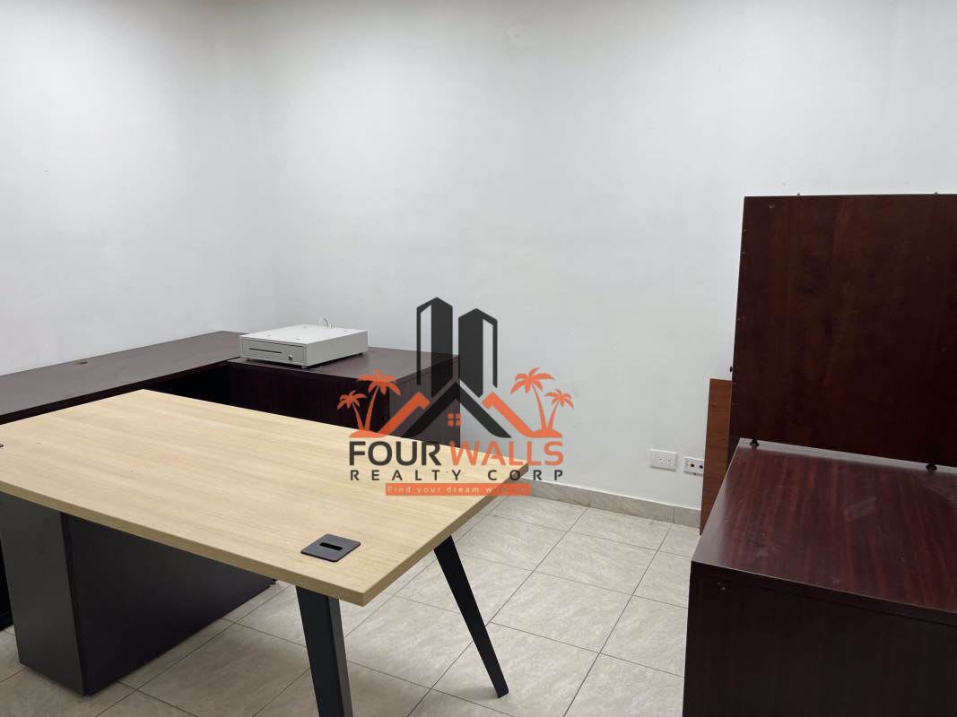 Workspace with desks, seating, minimalist décor office Panama rental