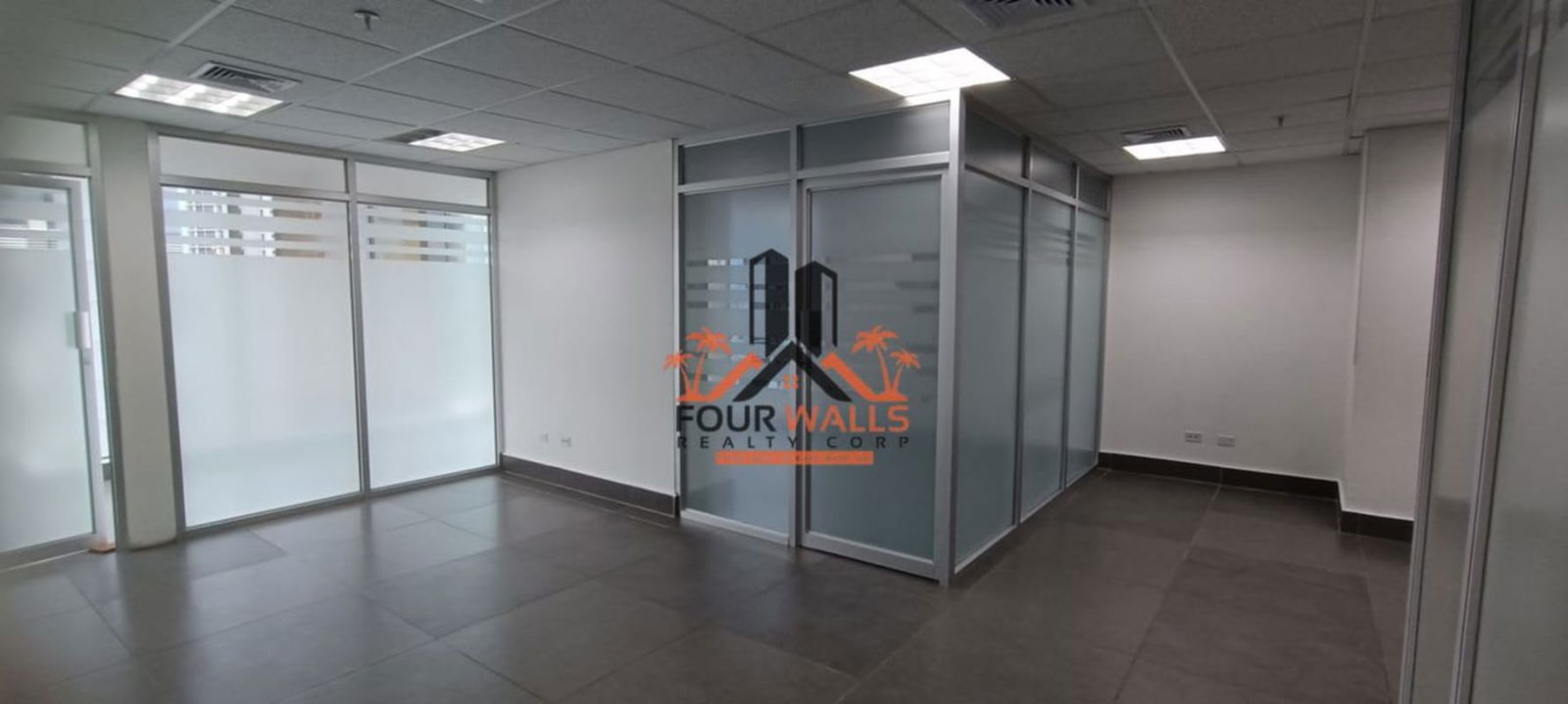 Modern meeting space with floor tile, glass door partitions in PH Twist Panama
