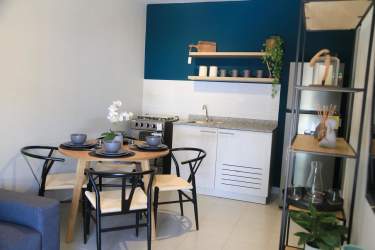 Basic laundry zone with cement sink tile backsplash Puerto Caimito