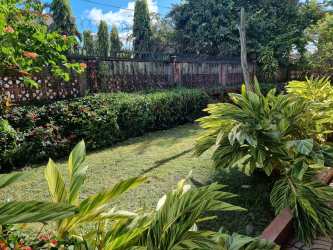 Home office room with wood desk, wall shelves, window and AC Margarita Colón Panama