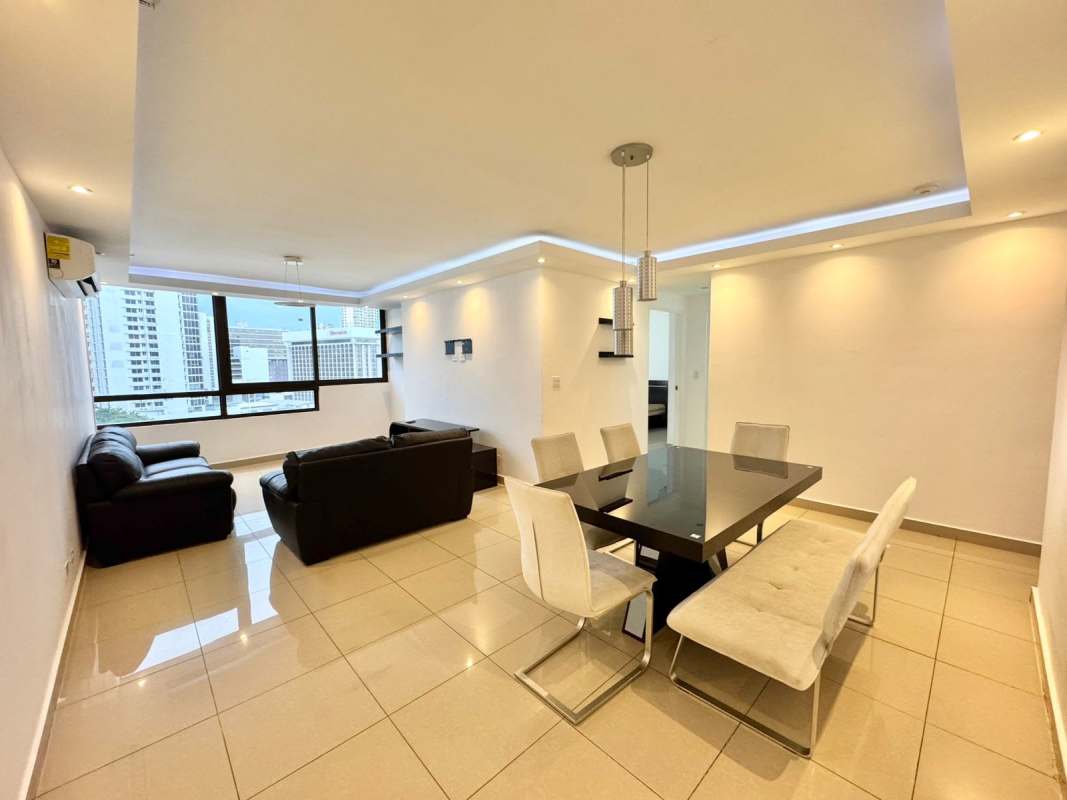 Bright open-plan living dining space with large windows in PH San Francisco Bay Panama City