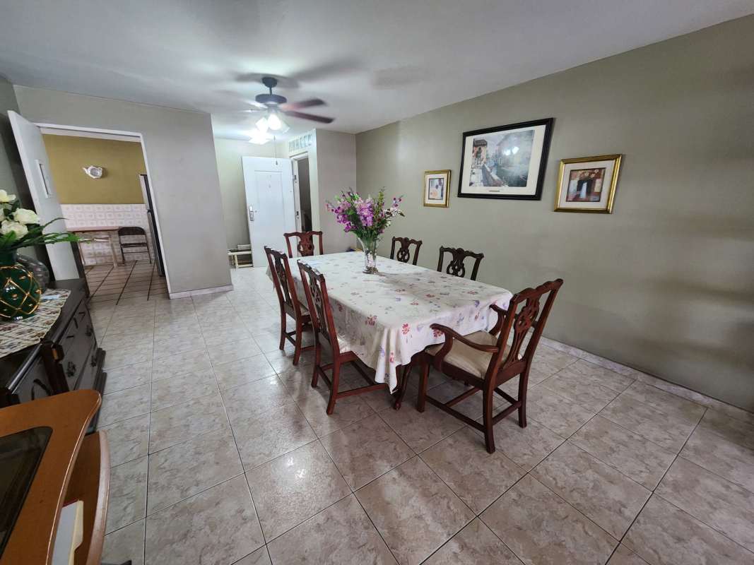 Dining area with ceiling fan and wall art PH Fuente de Trevi Villa de las Fuentes Panama