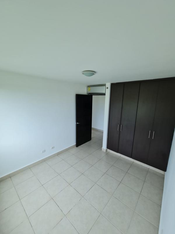 Bedroom with AC, large wooden wardrobe, tiled floors Clayton Park apartment Panama