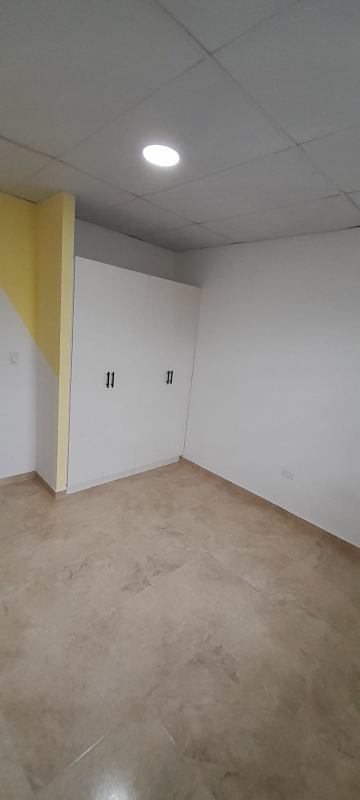 Bedroom with closet tiled floors bright light apartment in Llano Bonito Villa de Las Acacias Panama