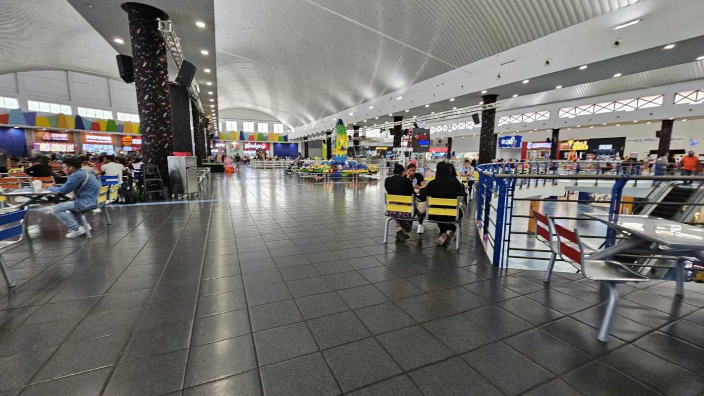 Colorful modern retail food court area with multiple dining options and natural light Albrook Mall Panama
