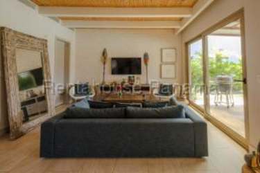 Contemporary bathroom with vessel sink, glass shower, luxury fixtures in Playa Escondida villa