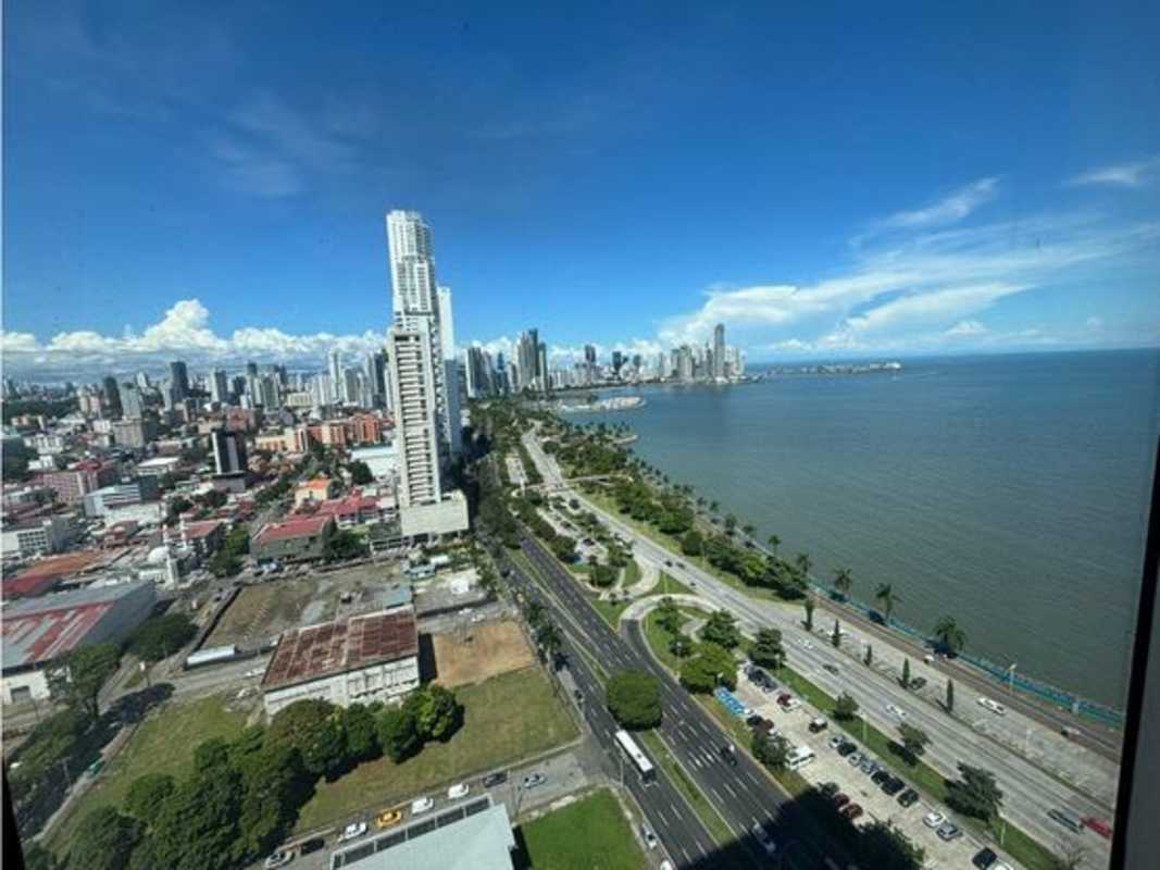 Contemporary bathroom with beige tiles and vanity at PH Balboa Office Center Panama