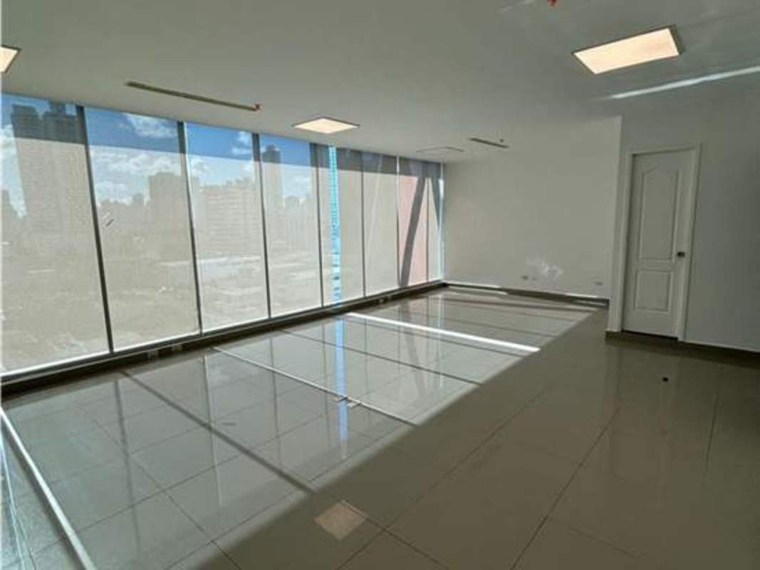 Bright tiled open space with floor-to-ceiling windows PH Office 77 Panama