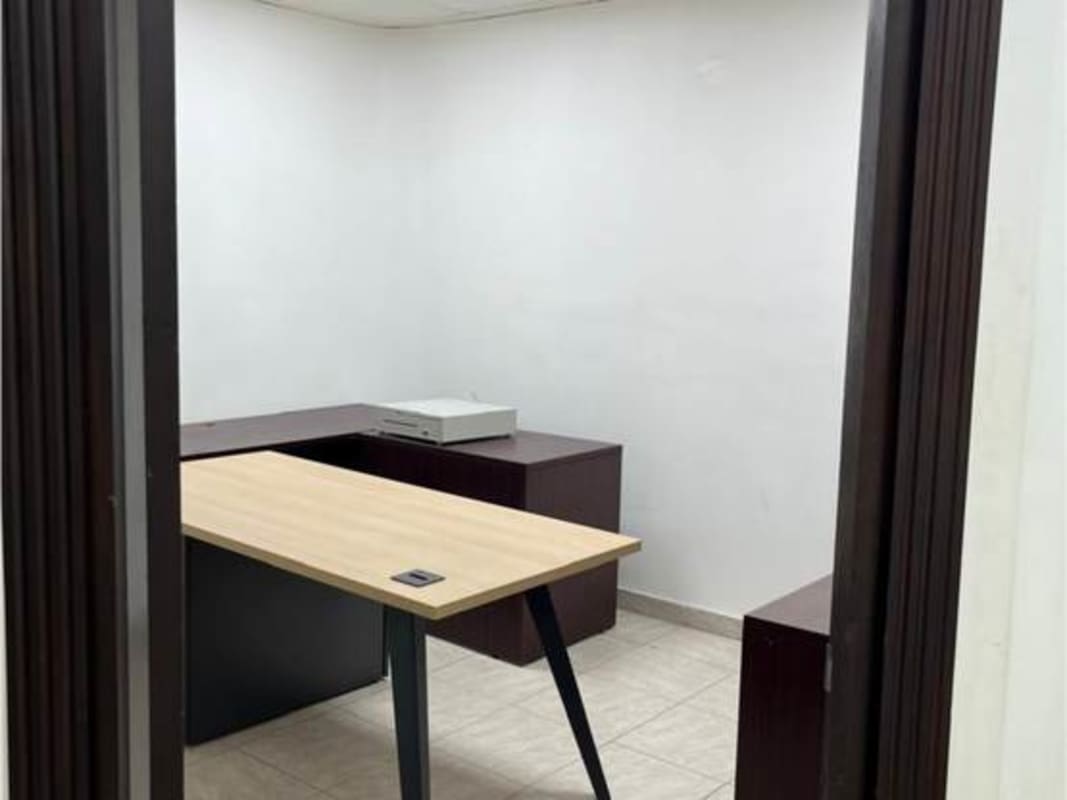 Bright reception or open area inside office space with glass windows in Panama City