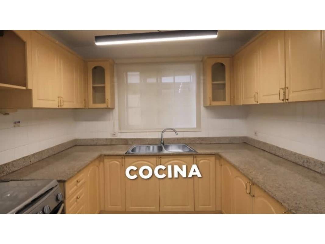 Traditional beige kitchen granite countertops stainless stove window with blinds Albrook Gardens Panama