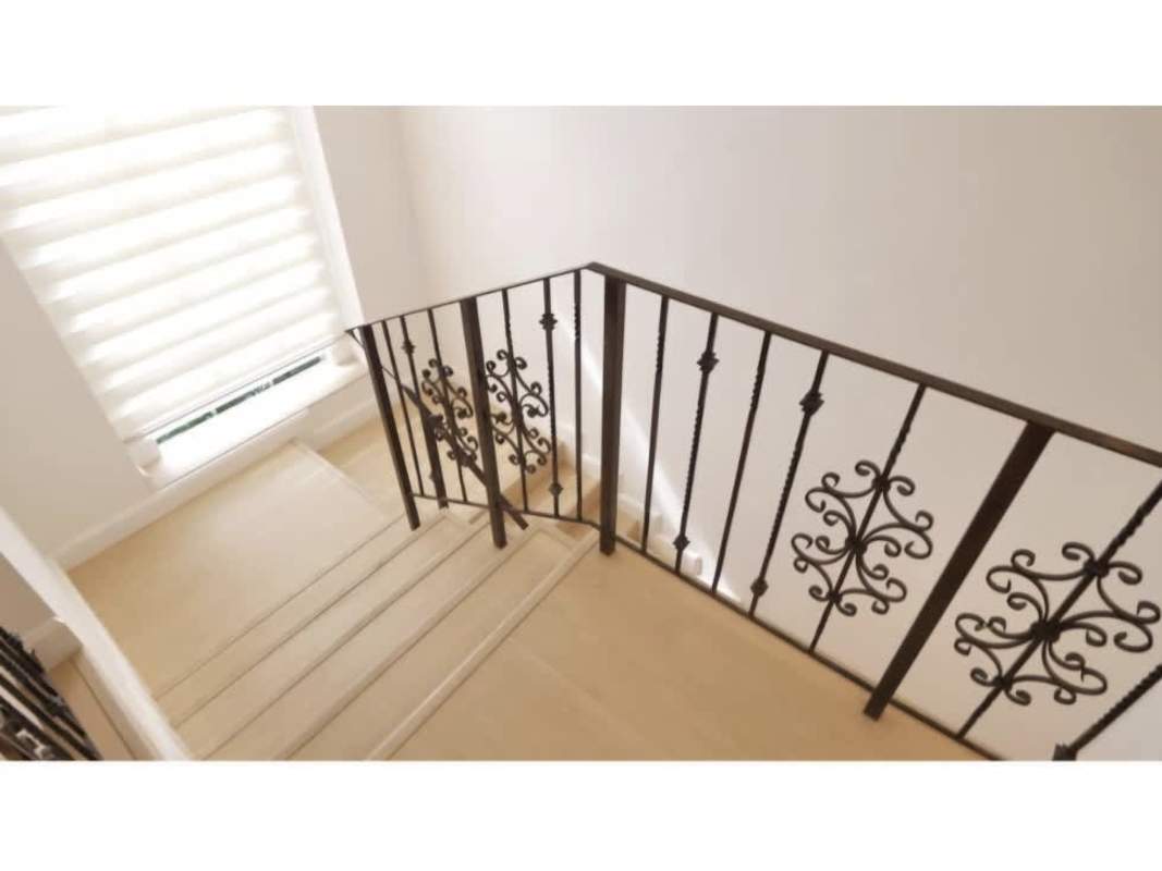 Staircase with iron railing natural light window PH Albrook Gardens Panama