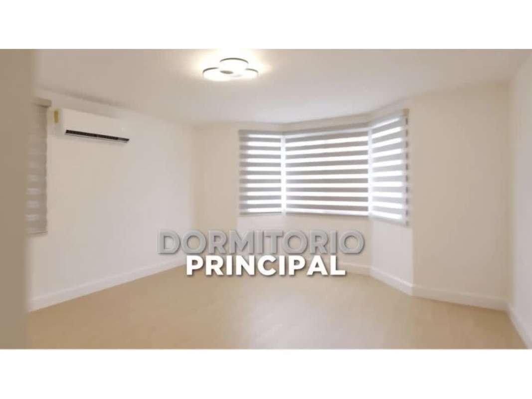 Spacious master bedroom bay window split AC striped blinds PH Albrook Gardens Panama