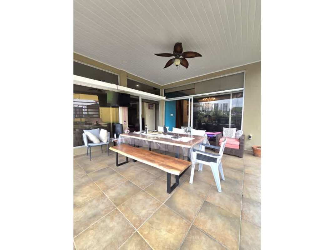 Outdoor gazebo with tiles, green garden in luxury Altos de Panamá home