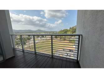 Modern bathroom featuring glass shower enclosure and elegant finishes at PH Mosaic Panama Pacifico