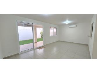 Modern kitchen with stainless steel appliances and granite counters in Bosques del Pacífico Panama Pacifico villa