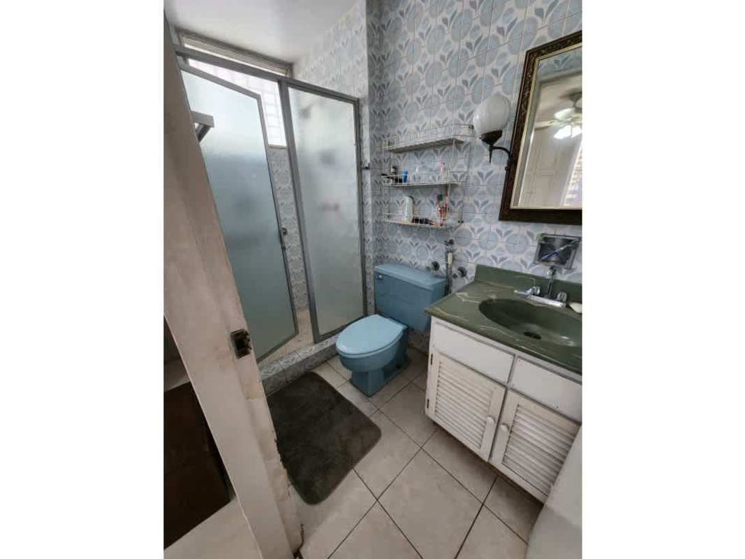 Kitchen with white cabinets, dual sink, refrigerator, and microwave Condo Villa de las Fuentes Panama