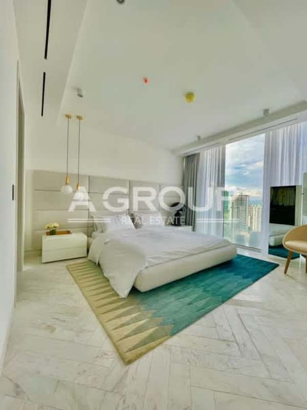 Bedroom with floor to ceiling windows city view modern design Wanders Yoo Panama