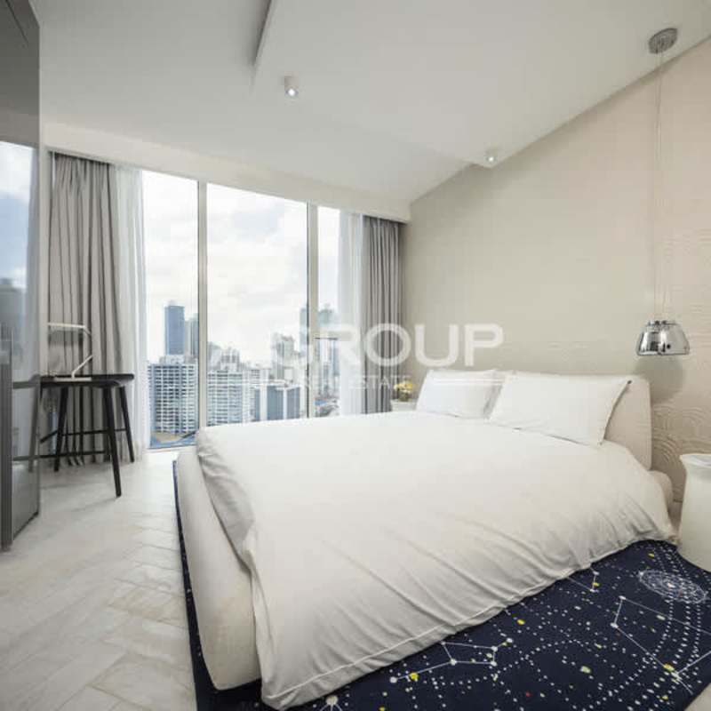 Modern bedroom floor-to-ceiling window city view minimalist luxury Wanders Yoo