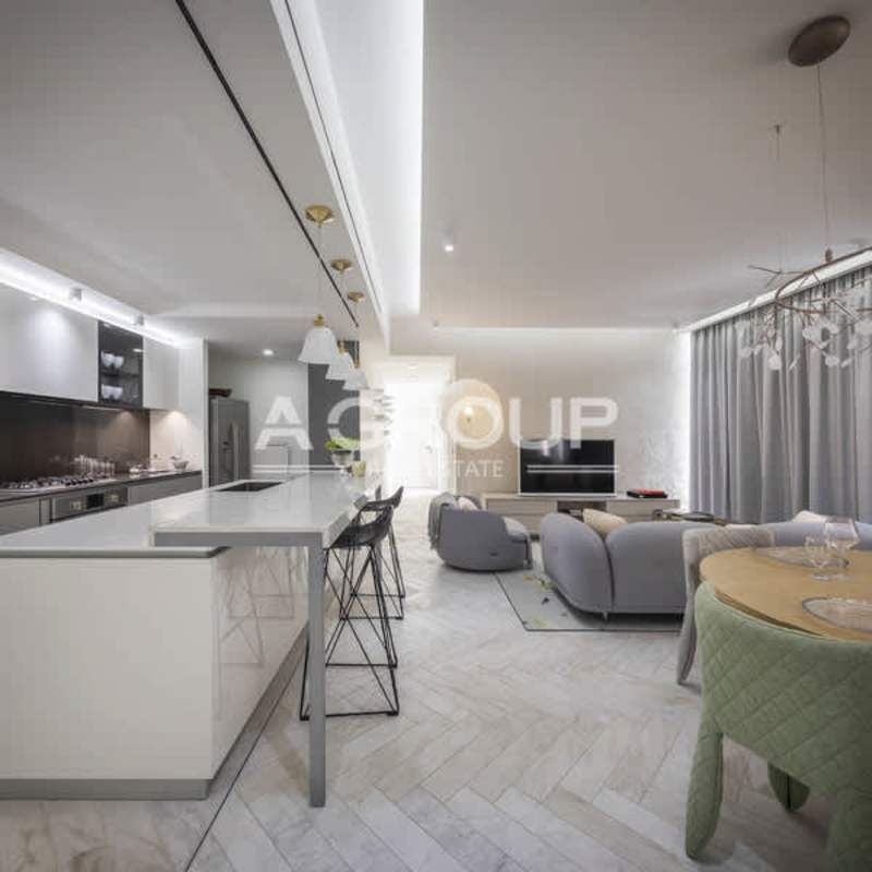 Contemporary open floor plan kitchen and living area Wanders & Yoo Panama