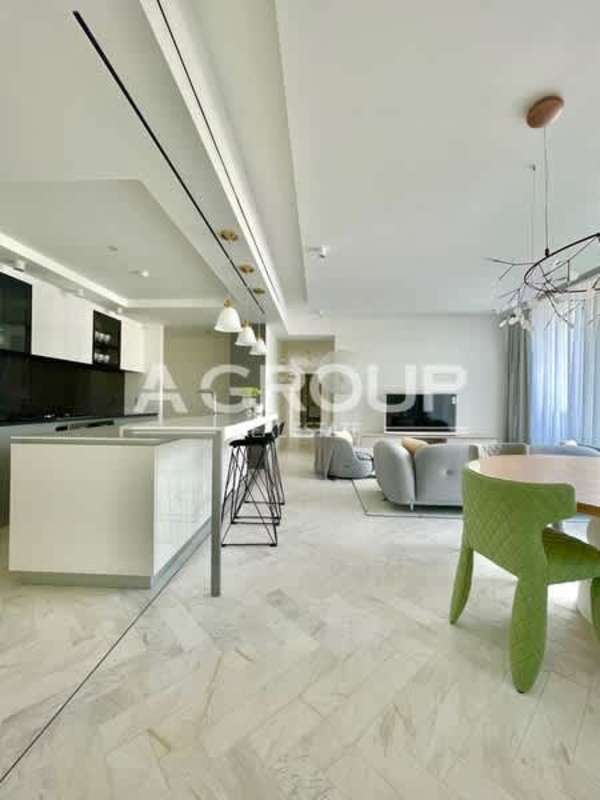 Contemporary kitchen island bar stools marble floors luxury apartment Wanders Yoo