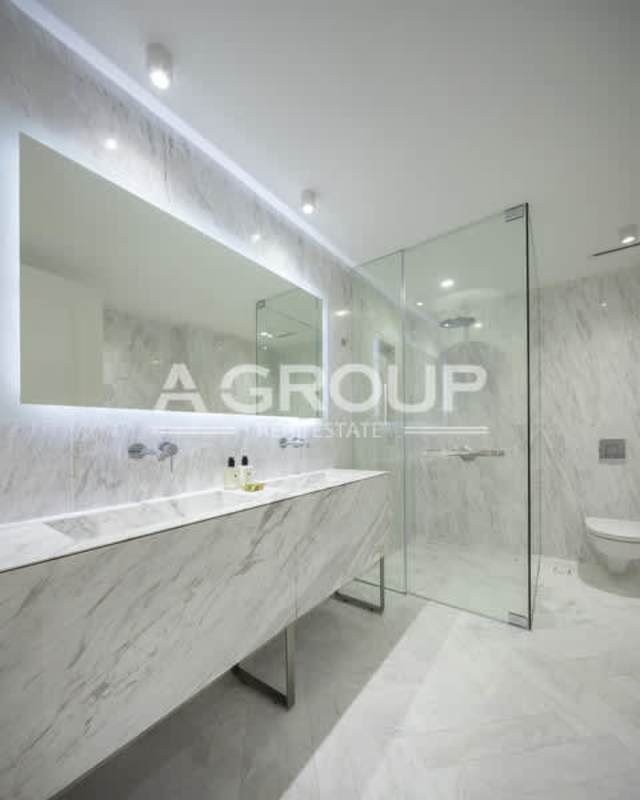 Marble floor double sink large mirror walk-in shower luxury bath Wanders Yoo Panama