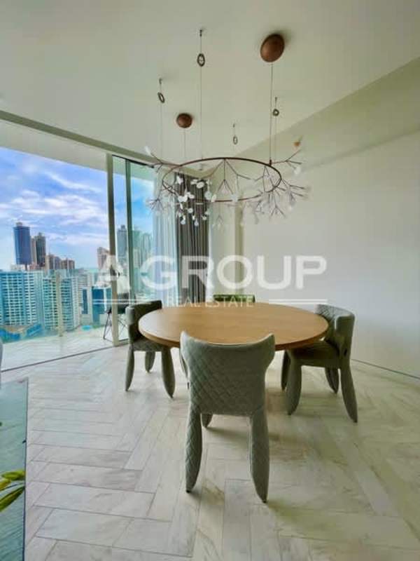 Modern luxury dining room overlooking Panama City skyline in Wanders & Yoo Marbella