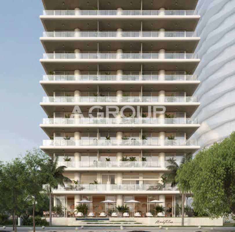 Multi-story luxury condominium tower Nautilus Amador with balconies and waterfront view