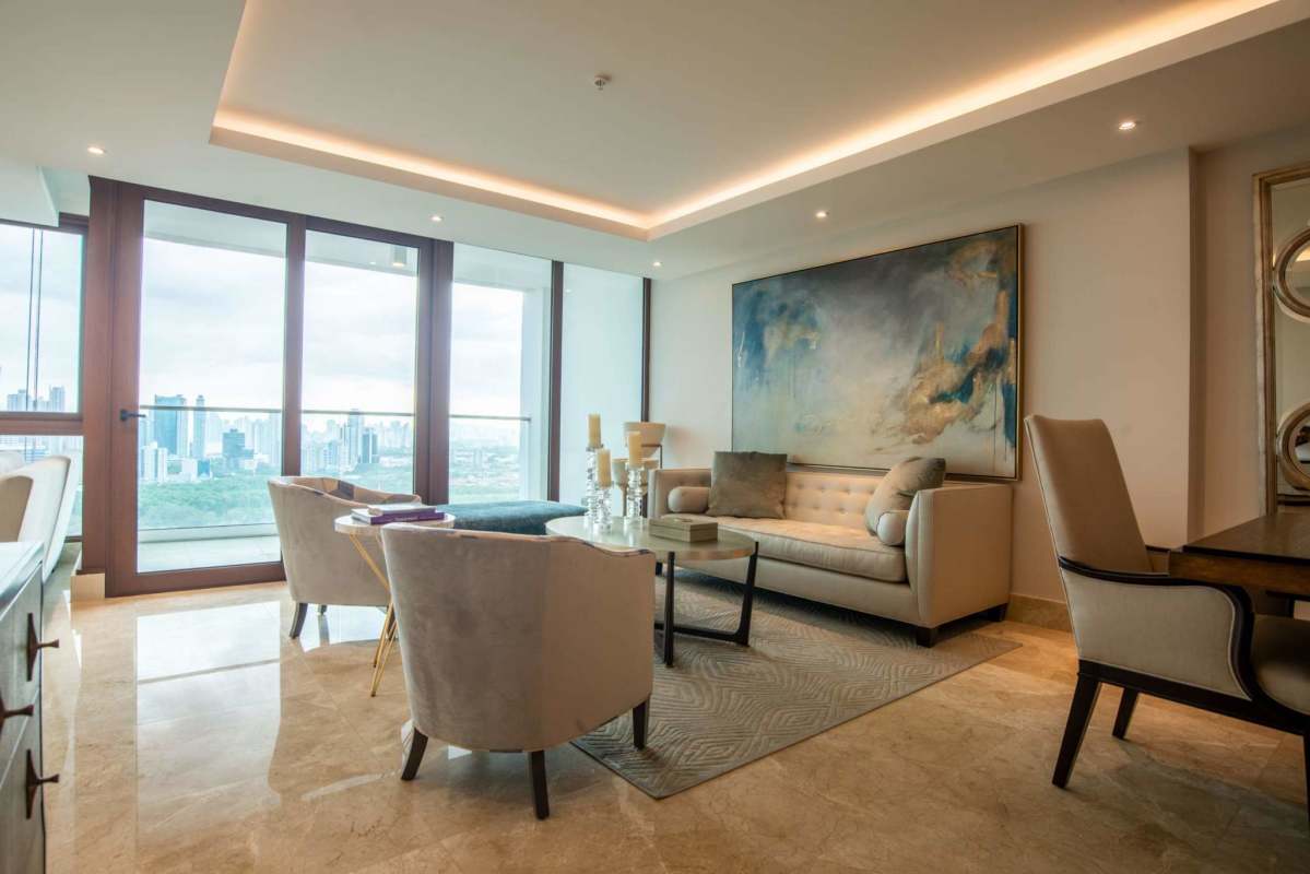 Living room with natural light overlooking Panama Canal at PH Nautilus Amador Panama City