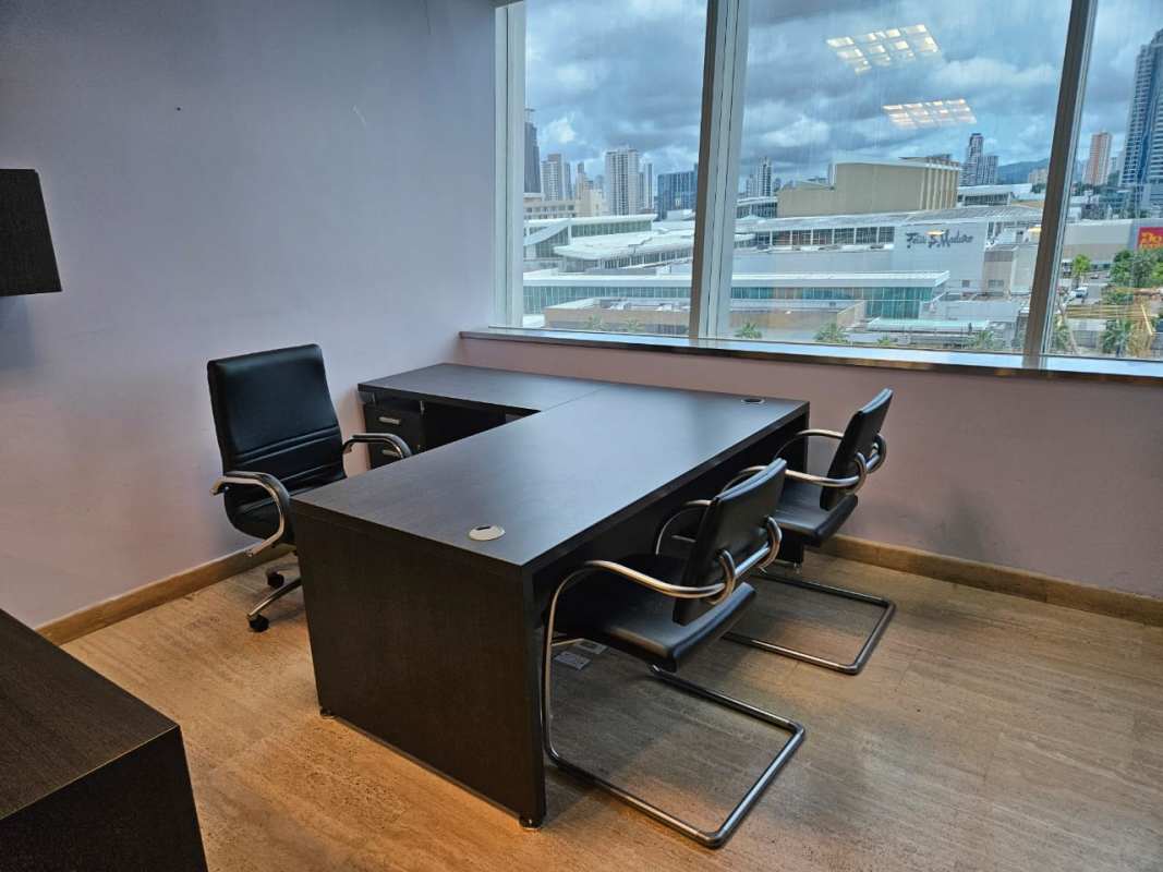 Modern corner office with panoramic window, built-in cabinets at Torre Las Américas, Punta Pacifica