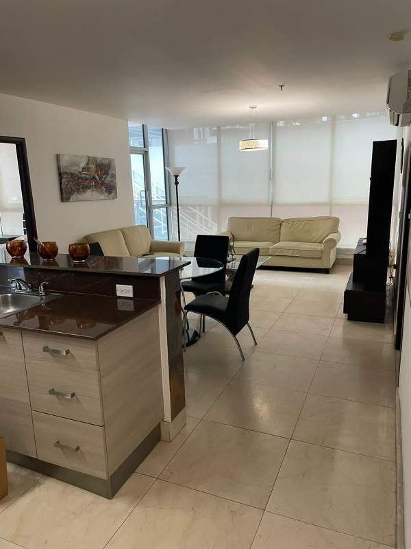 Spacious living area with floor-to-ceiling windows ocean views PH Villa del Mar Panama City