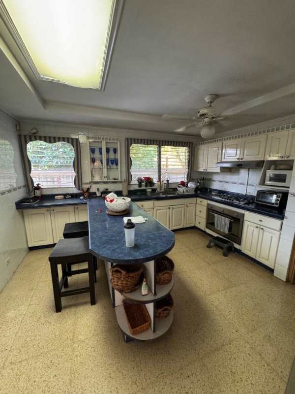 Traditional kitchen with island in San Francisco Panama house for sale