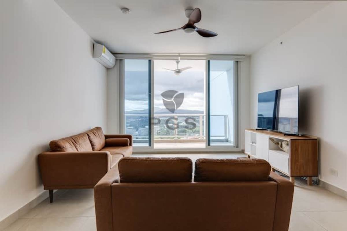 Modern island kitchen with wood accents PH Van Gogh El Cangrejo