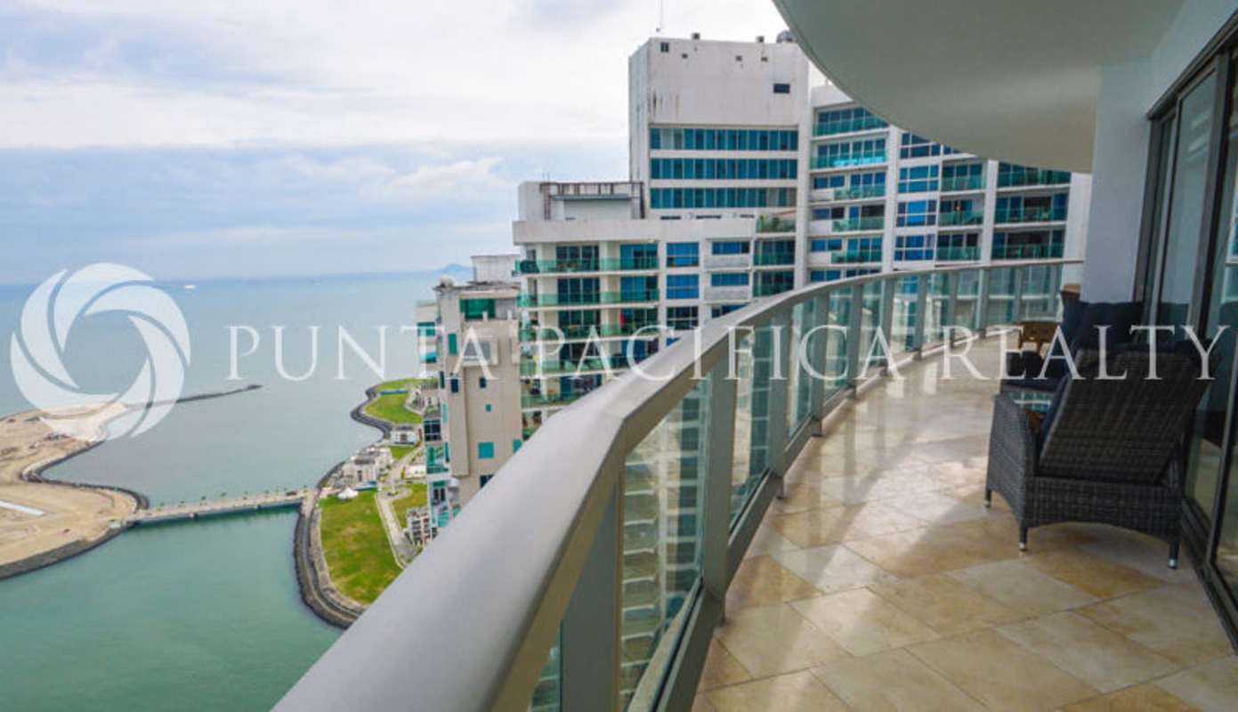 Modern kitchen with granite countertops and stainless appliances in PH The Ocean Club