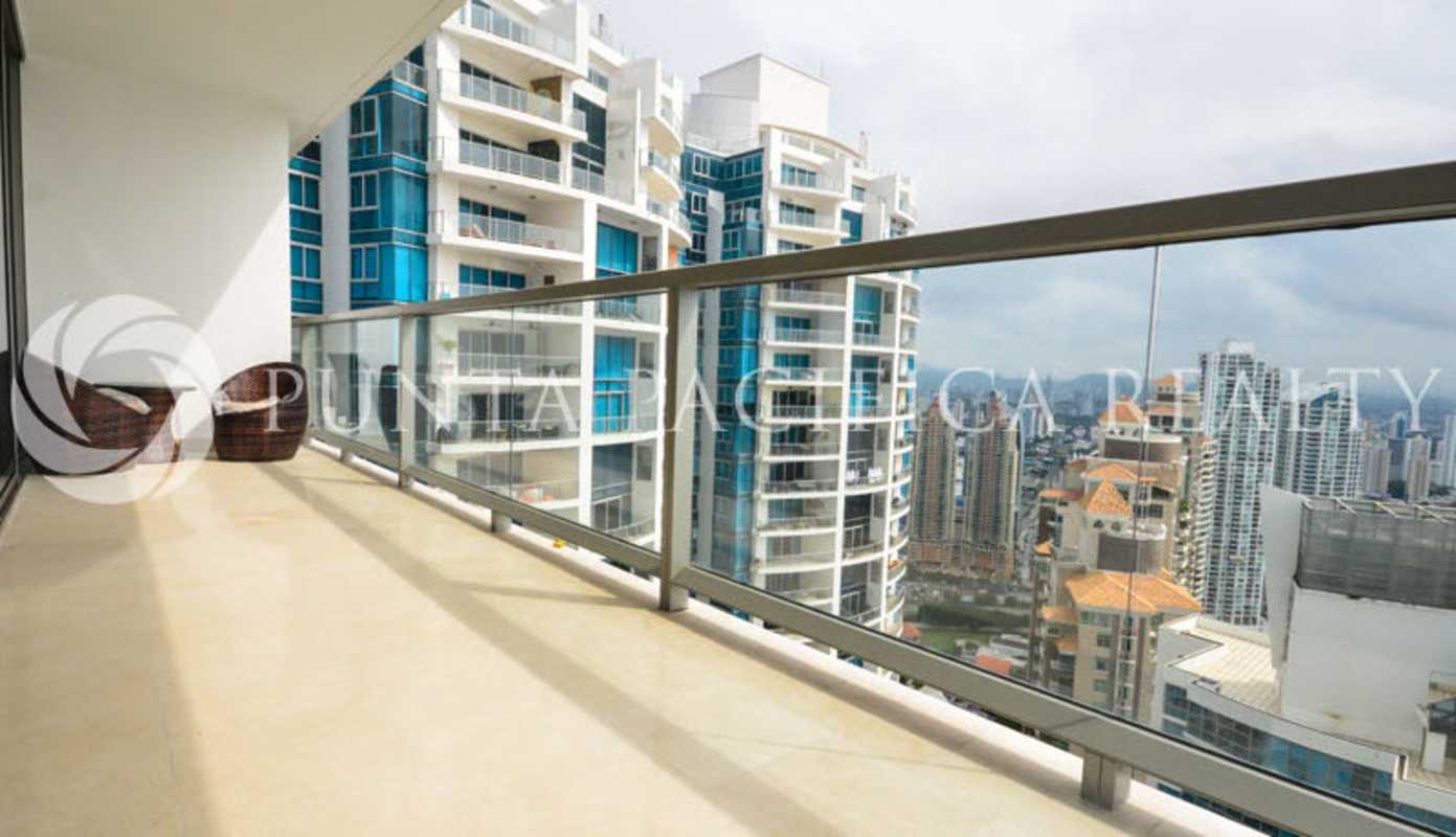 Contemporary kitchen with granite countertops and stainless appliances in The Ocean Club condo