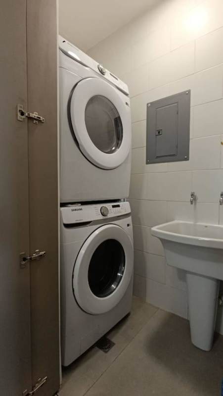 Laundry space with washer dryer and sink PH Victory Wellness Panama City