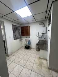 Covered carport and gated driveway with tiled floor in La Arboleda de Cáceres house for sale