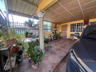 Cozy bedroom with curtains, tiled floors in La Arboleda Gated Community Panama