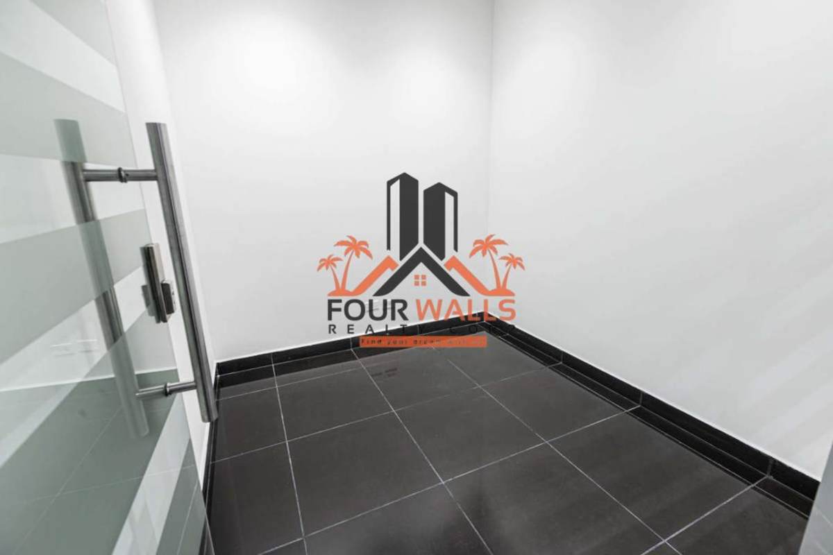 Premium executive office furnished with Italian leather chairs, glass walls, and city views in PH Office One Panama