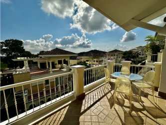 Covered balcony dining area overlooking lush golf course at Tucan Country Club Panama