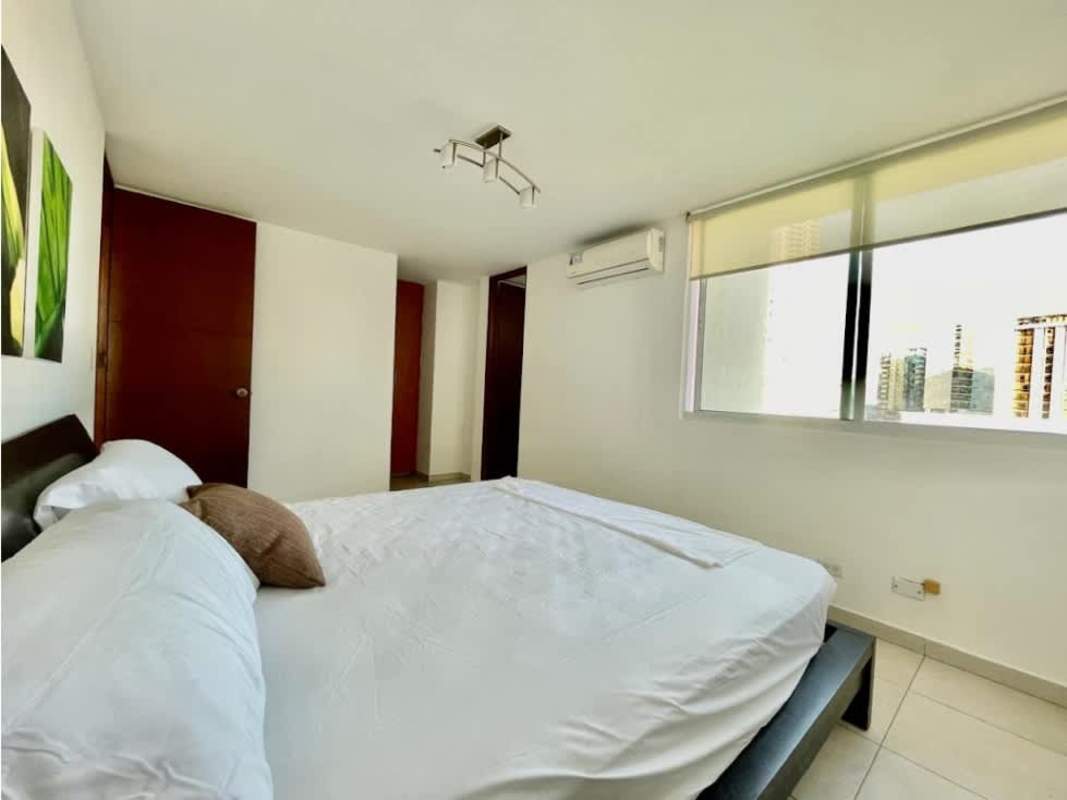 Bathroom with glass shower enclosure and pedestal sink in PH Terramar Panama City