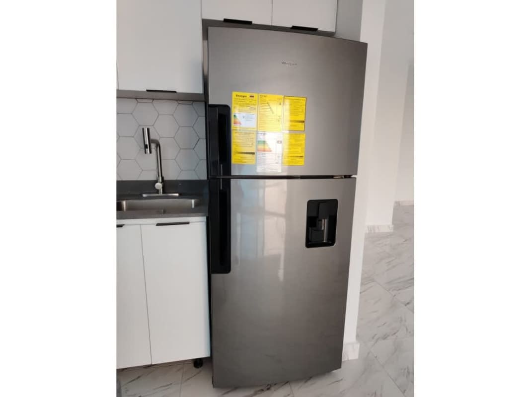 Bedroom with marble floors, ocean views, AC unit, and modern design in The Sands tower Panama City