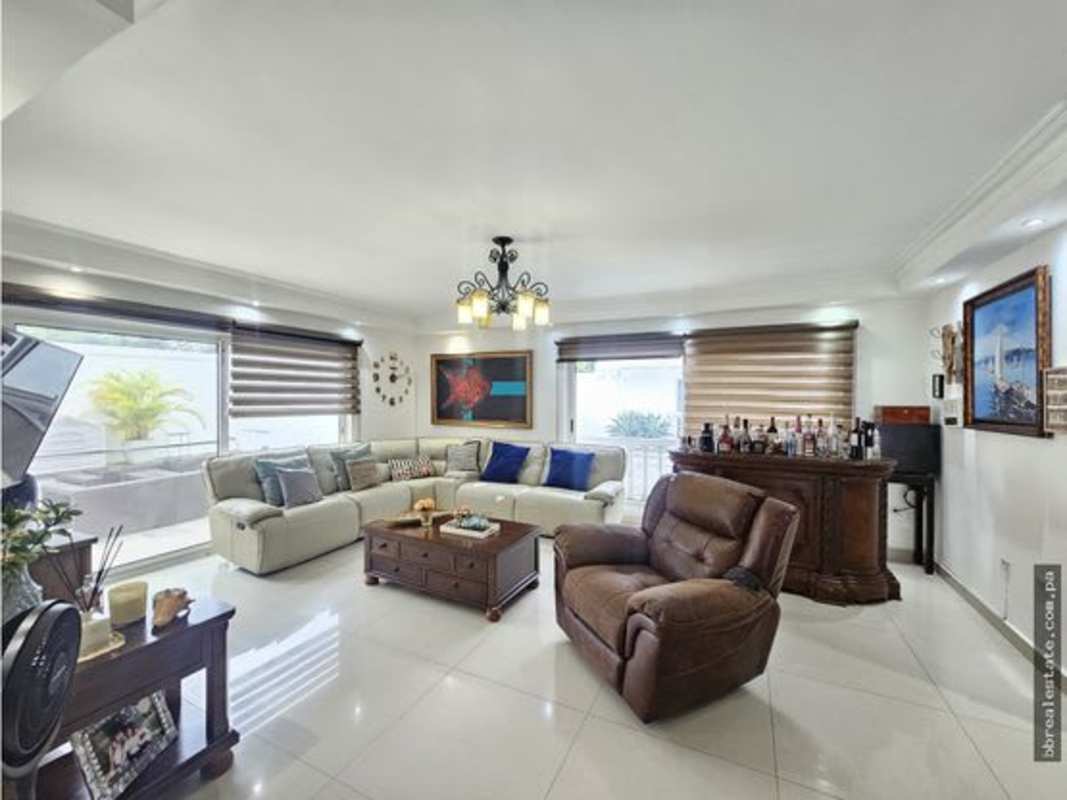 Comfortable family den or TV lounge area with seating in Altos del Golf luxury house Panama