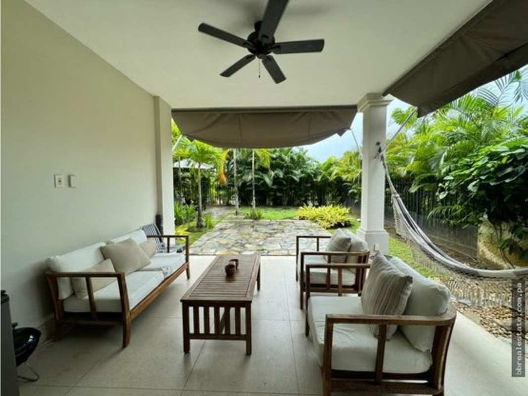 Bright spacious living area with marble floors in luxury house The Grove Santa Maria Panama