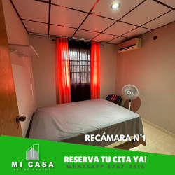 Modern living and dining room with sofas and dining table in Villa Karola Penonomé Panama