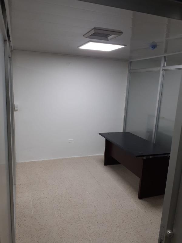 Private office with frosted glass walls, tiled floors inside Plaza Paitilla Punta Paitilla