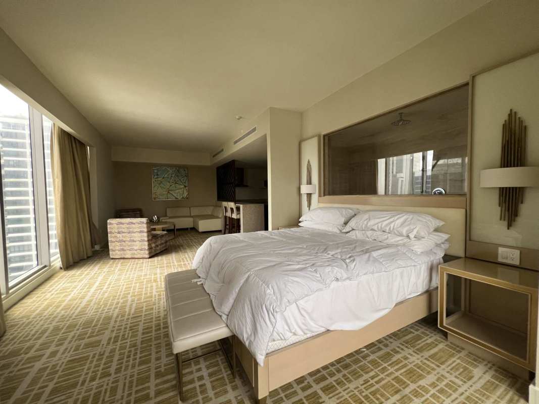 Modern bathroom with marble finishes, vessel sink, walk-in rain shower at PH Waldorf Astoria Panama